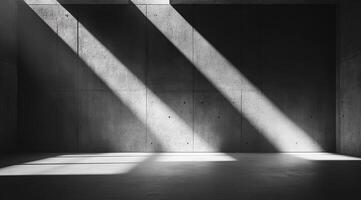 A polished concrete wall with a smooth floor, lit by varied light and shadow, effectively showcases products and provides a space for impactful text that communicates with the audience photo