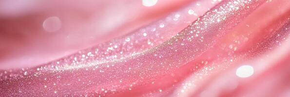 A stunning glistening pink fabric texture adorned with sparkling highlights for various design projects and purposes photo