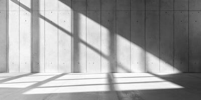A minimalist concrete space cleverly showcases dynamic light and shadow patterns, making it an ideal setting for impressive product displays, professional presentations, and creative exhibitions photo