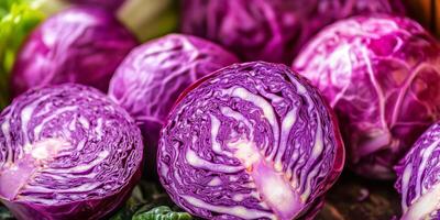 A vibrant and detailed closeup view of fresh, purple cabbage, highlighting its intricate patterns and unique textures photo