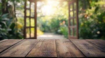 An empty, rustic wooden table top set against a softly blurred green garden backdrop creates a perfect environment for showcasing products while also promoting a sense of tranquility and calm photo