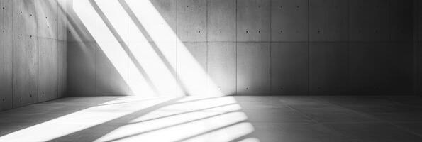 A tranquil concrete environment, illuminated by light and shadow, serves as a backdrop for product displays and presentations, enhancing their aesthetic appeal with a calm atmosphere photo