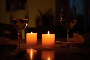 A candlelit dinner setup with space for a message. photo