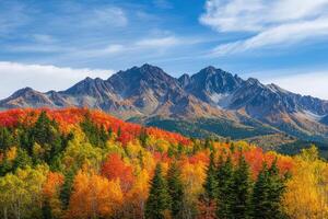A breathtaking mountain range adorned with autumn colors. photo