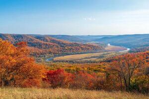 A panoramic view from a hilltop in autumn. photo
