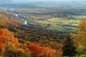 A panoramic view from a hilltop in autumn. photo
