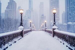 A city bridge covered in snow with the skyline in the background. photo