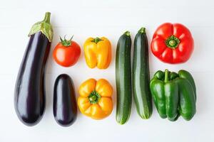 Late summer harvest of fresh vegetables on a clean background. photo