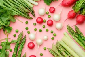 Fresh spring vegetables on a pastel-colored background. photo