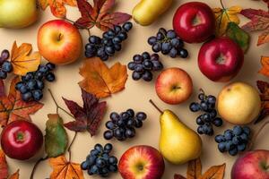 A warm-toned flat lay of autumn fruits like apples, pears, and grapes. photo