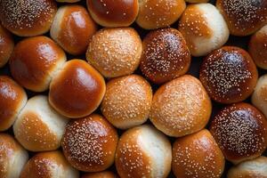 A selection of buns creates a warm, inviting background. photo