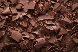 A textured layer of shredded chocolate forms a rich, indulgent background. photo