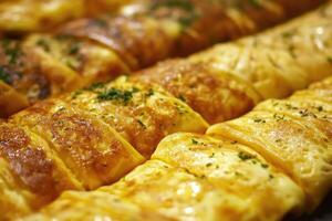A rich array of French omelettes creates a savory, elegant background. photo