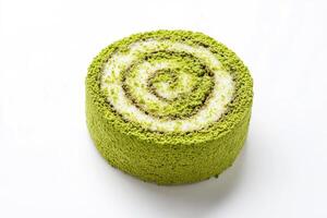 A matcha roll cake with matcha powder. photo