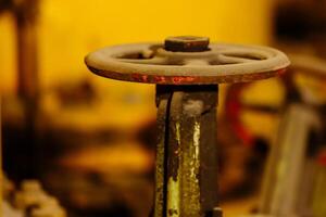 Closeup of pipeline valve at drilling platform. photo