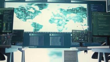 Cyber security monitoring room with high tech equipment. Governmental focus on cyber operations, cyber surveillance, and digital threats protection in an empty command workspace. Camera B. photo