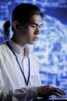 Certified engineer using laptop to maintenance artificial intelligence neural networks simulating human thought processes in computerized model. Skilled employee doing checkup on AI systems photo