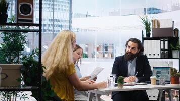 Financial advisor assessing clients economic needs and goals to provide personalized planning advice. Agent optimizing investment returns for family requesting help while managing risk, camera A photo