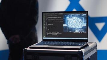 AI software on laptop used by state of Israel security services to prevent terrorism attacks. Artificial intelligence tech used by Mossad agency to defend borders, isolated over Israeli flag, camera A photo