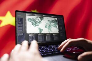 China red army expert conducts tactical reconnaissance, utilizing software on laptop for data analysis. Close up shot of notebook used by soldier in control room to look at at aerial map on screen photo