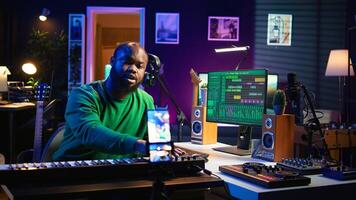 Piano teacher hosting online lesson for all beginners people on social media, sharing insights and techniques in playing electronic keyboard notes. Educational tutorial with synthesizer. Camera B. photo