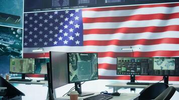Empty modern base of operations used by the US military armed forces, safeguarding state secrets and ensuring security protocols. High tech surveillance gear used for intelligence. Camera B. photo