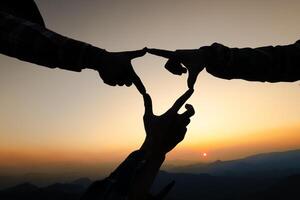 Silhouette of Hands together, business people and team building for company mission, project collaboration and group support, hand stack sign and diversity circle for teamwork goals photo