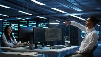 Admin in data center using augmented reality technology to ensure system can handle networking tasks. Server room worker looking at AR visualization hologram, tracking network traffic, camera B photo