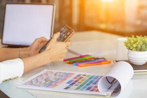 Smooth Focus, group of web designers are working together to develop mobile responsive website with UI UX Front End Designer Previewing. website designers in form of mobile applications with UI UX photo