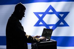Mossad agent responsible for Israel air defense, relaying instructions to squadrons patrolling over borders. Military counterintelligence department specialist using laptop software to do monitoring photo