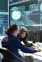 Governmental hackers doing teamwork in protecting sensitive information from cyber threats of digital mercenaries. Experts focusing on online security and cyber defense tactics. photo