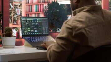 AI software engineer coding modern innovative development project on his gadgets, showcasing machine learning and data processing on neural network. Artificial intelligence business. Camera A. photo