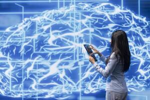 Computer scientist solving tasks on tablet, running artificial intelligence programming scripts. Engineer manipulating lines of code for AI applications development on digital device photo