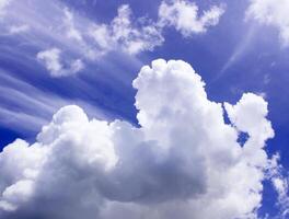 Beautiful white clouds with blue sky background photo