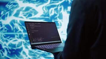 Technician uses laptop and AI neural networks modeled after human brain to solve complex problems. Close up of worker using deep learning to look at data and complete tasks, camera B photo