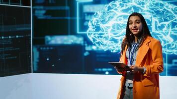 Specialist talking at global conference, exploring subjects such as enterprise AI, machine learning, security, ethical AI, deep learning, data ecosystems and natural language processing, camera A photo