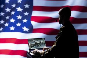 American dispatcher responsible for USA air defense relaying instructions to squadrons patrolling over borders. NATO alliance military expert uses notebook software to do monitoring photo