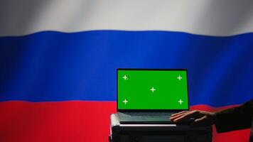Russian soldier using military tech on green screen laptop to identify threats from enemies. Russia ex KGB FSB personnel using software on mockup notebook to relay info to war front lines, camera B photo