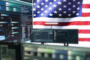 High tech governmental cyber operations center with USA flag. Network security, cyber defense and global surveillance to protect national security. Hacking tools for digital defense. photo