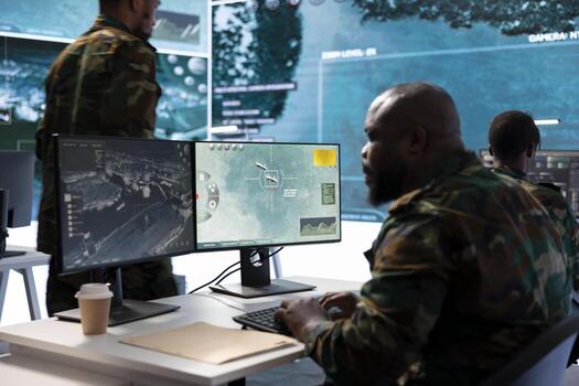 Military staff in a high tech monitoring room work on data integration, processing real time surveillance for crucial mission tactics. Maintaining security protocols to support strategic operations. photo
