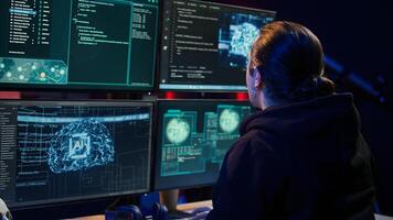 Rogue IT engineer uses AI deep learning to develop zero day exploit undetectable by antivirus. Hacker uses artificial intelligence computerized model to build script doing data mining, camera B photo