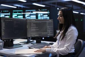 Data center manager checking emergency procedures documents to ensure company continuity in case of system failure. Inspector in high tech server hub ensuring compliance with industry regulations photo