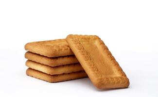 Indian biscuits stacked over white background photo