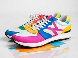 modern sports shoes, colorful sneakers isolated on white background. photo