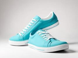 modern sports shoes, cyan white sneakers isolated on white background. photo