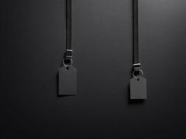 Black Paper Price Label With String Isolated on black background. photo