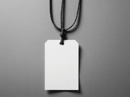 White Paper Price Label With String Isolated on gray background. photo