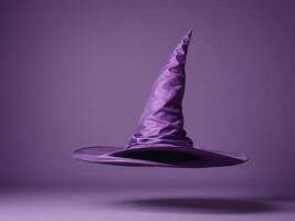 purple witch hat isolated on purple background. photo