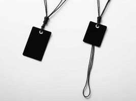 Black Paper Price Label With String Isolated on white background. photo