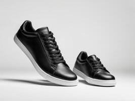 modern sports shoes, black white sneakers isolated on white background. photo